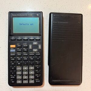 Texas Instruments TI-85 Graphing Calculator in Black with Black Slide Cover
